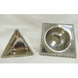 Two Scottish Traprain Treasure reproduction silver dishes by Brook and Son, the large square dish