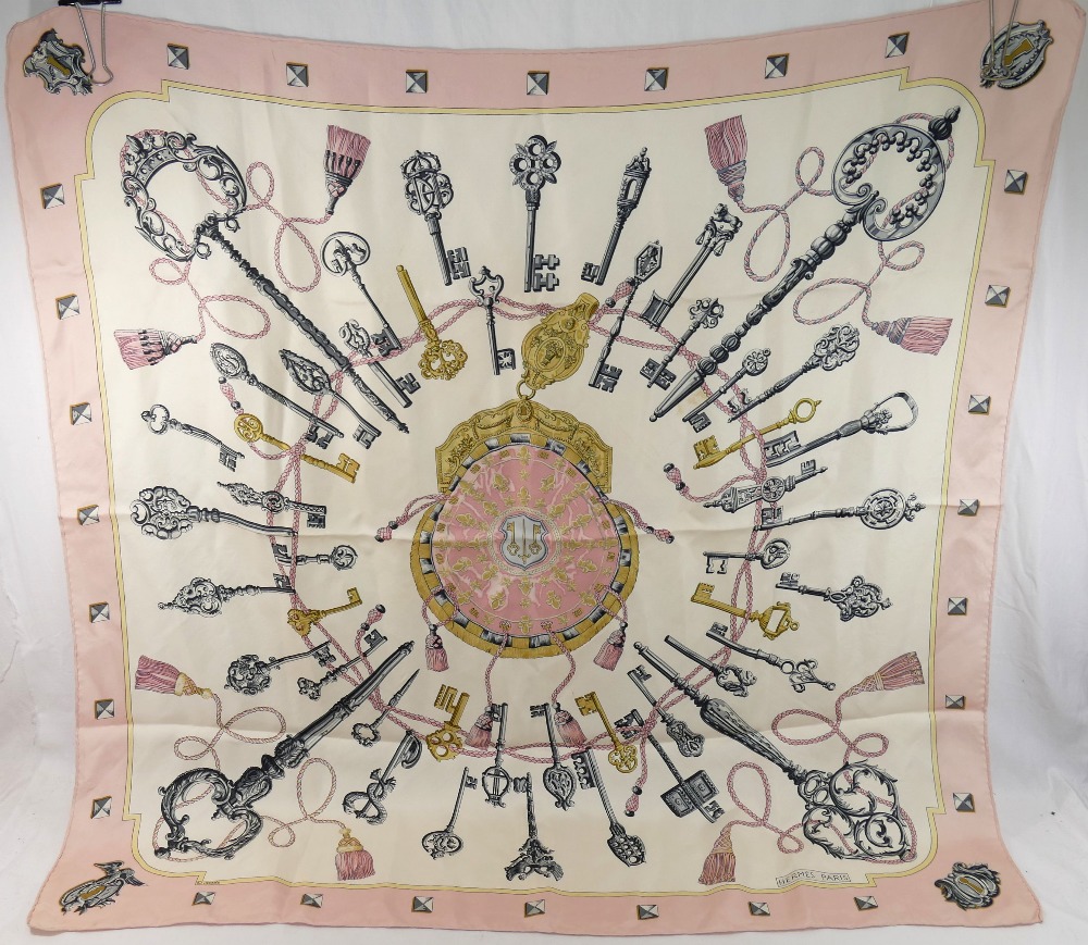 A 1960's Hermes of Paris silk scarf, 'Les Cles' by Cathy Latham, with pink border, 89cm x 87cm