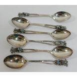 A set of six Australian coffee spoons with opal set terminals, by Dan Flynn, stamped 'STG SIL',