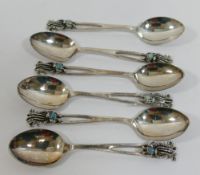 A set of six Australian coffee spoons with opal set terminals, by Dan Flynn, stamped 'STG SIL',