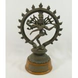 An Indian bronze figure of the Hindu god Shiva, raised on oval wooden plinth  CONDITION REPORTS &