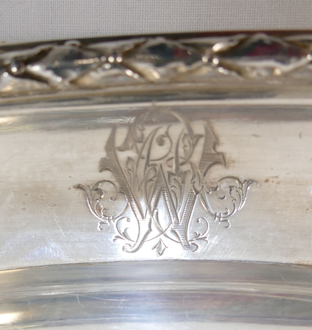 A pair of French silver serving dishes, of oval form, cast with ornate rim, bearing import marks for - Image 2 of 4