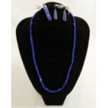 A selection of lapis lazuli jewellery comprised of a beaded necklace, five pendants and a pair of