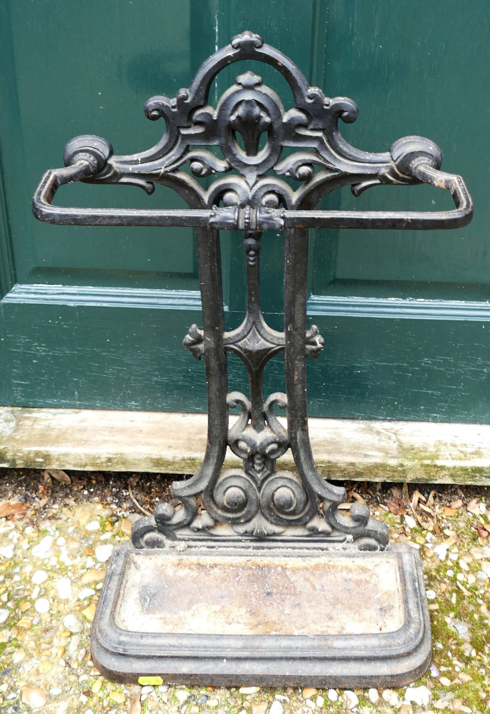 A black painted cast iron umbrella stand, 64cm high x 37.5cm wide CONDITION REPORTS & PAYMENT