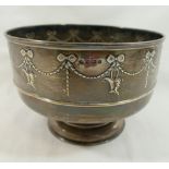 An Edwardian silver pedestal bowl, Birmingham 1907, the sides embossed with ribbon, swag and