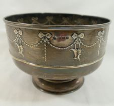 An Edwardian silver pedestal bowl, Birmingham 1907, the sides embossed with ribbon, swag and