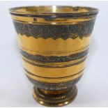 A gilded footed cup by Puiforcat, Paris for Cartier New York, the rim bearing the maker's mark for