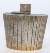 A silver gilt hipflask made for Cartier, London, with graduated banded decoration, London 1973,