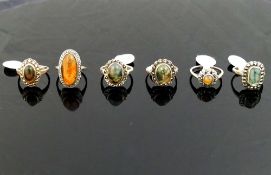 A selection of moss agate and marcasite jewellery comprised of a bracelet, six rings, two