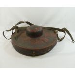 A pair of Buddhist brass cymbals, 30.5cm diameter, with leather handles, housed in red painted