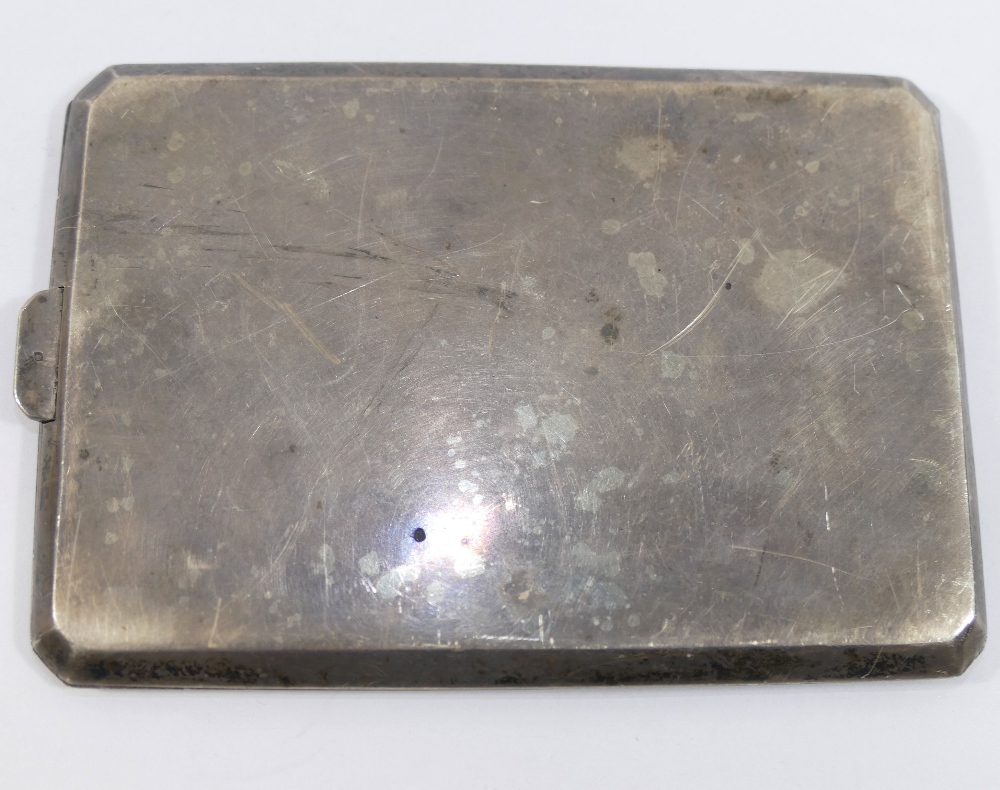 A rectangular silver cigarette case, Birmingham 1922, the lid inlaid with yellow metal bands, 12cm x - Image 2 of 3