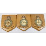 Three Royal Air Force wooden wall plaques/shields relating to Squadrons 93, 111 and 147, and three