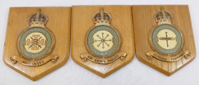 Three Royal Air Force wooden wall plaques/shields relating to Squadrons 93, 111 and 147, and three