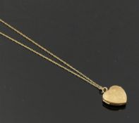 A 9 carat gold heart-shaped locket, 1.8cm wide, and a fine yellow metal chain stamped '375', 47cm
