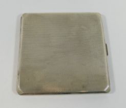 An Asprey and Co. square silver cigarette case, with engine turned decoration, Birmingham 1929, with