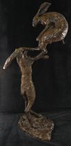 Paul Jenkins (20th/21st Century British), bronze of two fighting hares, numbered 18/95,