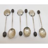 A set of six George VI silver coffee spoons, Birmingham 1949, with shell-shaped bowls and coffee