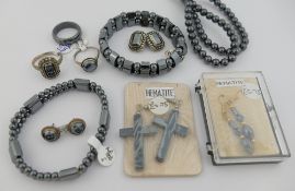 A quantity of hematite jewellery comprised of two bracelets, two bead necklaces, four pairs of