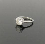 A 1930's diamond solitaire ring, the round brilliant cut stone approximately 2.3 carats, SI II