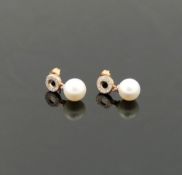 A pair of 9 carat rose gold cultured pearl and diamond drop earrings, the white pearls 8.5mm