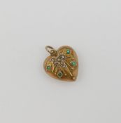 An Edwardian 9 carat gold hollow turquoise and seed pearl set heart-shaped pendant, Chester 1903,