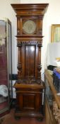 A large late 19th/early 20th century German Lenzkirch style mahogany long case clock, with chain