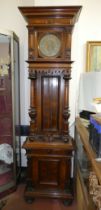 A large late 19th/early 20th century German Lenzkirch style mahogany long case clock, with chain