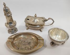 Four small silver items, comprised of a pepperette. mustard pot, ashtray and salt, combined weight