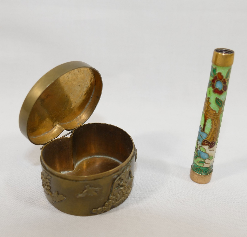 A small Japanese bronze box, with hinged lid, decorated in relief with birds, fruit and trees, 4.5cm - Image 2 of 3