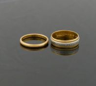A 22 carat gold wedding band, Birmingham 1931, 2mm wide, finger size N 1/2, 3.2g, and a 22 carat