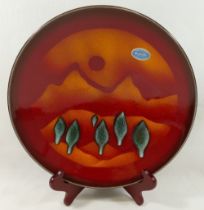A Poole Pottery limited edition dish from 'The Elements' series entitled 'Earth', designed by