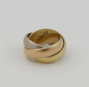 A Jacques Cartier 18 carat tri-colour gold trinity ring, London 1974, finger size G 1/2, 13.7g