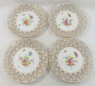 A set of four late 19th century hand-painted Meissen-style plates by Richard Klem of Dresden,