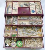 A collection of silver jewellery, including a charm bracelet, watch chain, filigree items,
