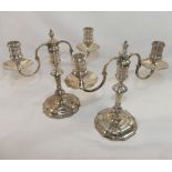 A pair of Asprey and Co. small silver two-light candelabra, London 1963, maker's mark, the removable