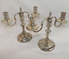 A pair of Asprey and Co. small silver two-light candelabra, London 1963, maker's mark, the removable