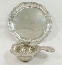 A small German silver circular tray, with shaped rim and initialled 'H' to the centre, 16cm