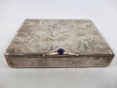 A Jacques Cartier silver cigarette case, with samorodok finish, based on an earlier design by