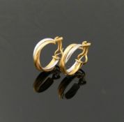 A pair of Cartier tri-colour trinity earrings, 2.2cm diameter, maker's mark to clasp, stamped '18K',