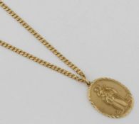 A large 1970's oval 9 carat gold St. Christopher pendant, Birmingham 1975, 2.5cm x 3.6cm, 9.9g,