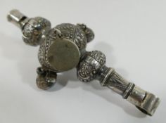 An Edwardian silver babies rattle/whistle, teether ring lacking, one bell replaced with a disc