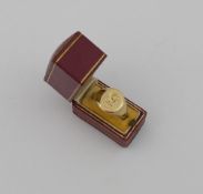 A yellow metal signet ring, crest and hallmarks worn, finger size N, 8.6g, housed in Cartier box