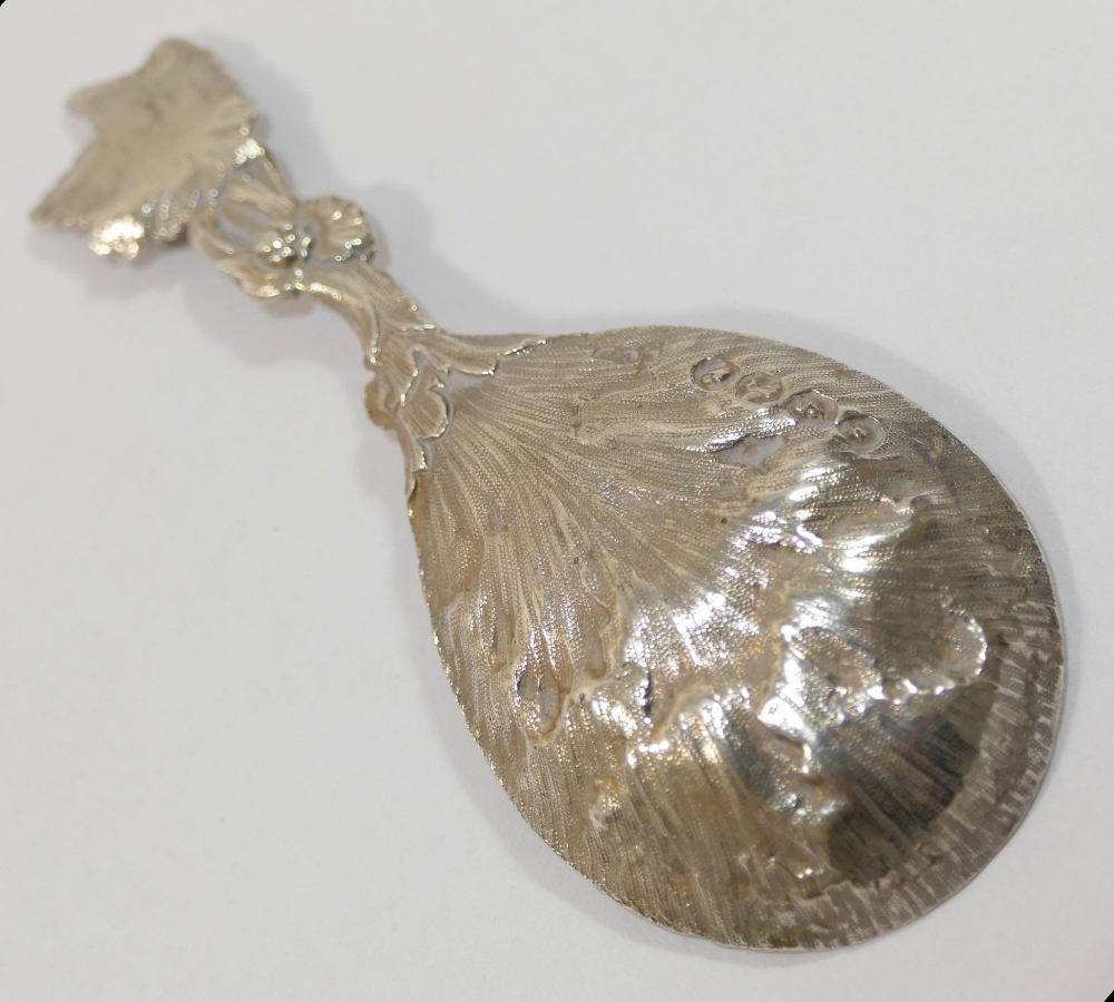 A Victorian silver caddy spoon, cast with acanthus leaf decoration, London 1862 by George W Adams, - Image 2 of 2