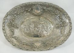 A 19th century German silver basket, the pierced sides embossed with floral swags and oval