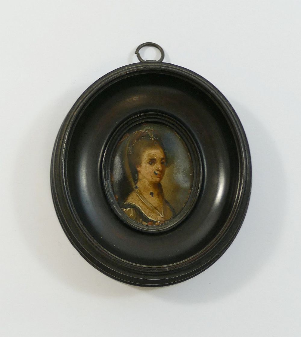 An oval portrait miniature of a lady, oil on copper, possibly 17th century Dutch, 4.7cm x 3.9cm,