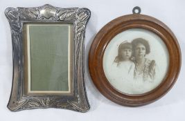 An Art Nouveau silver photograph frame, Birmingham 1904, the aperture 14cm x 10cm, the frame 20.