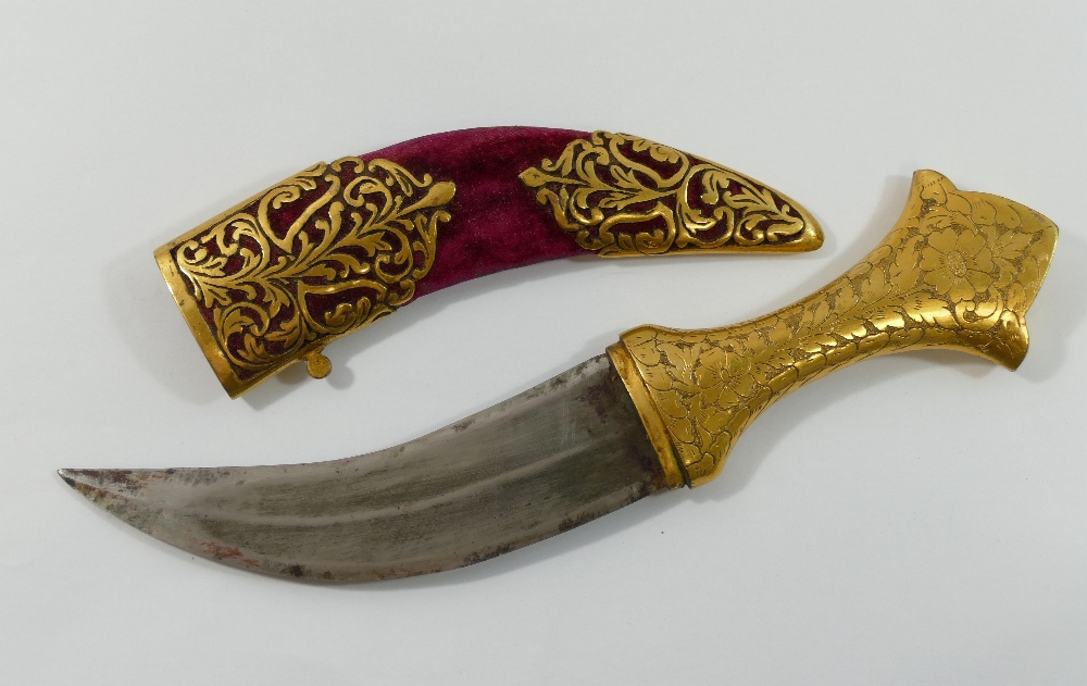 An Indian jambiya dagger, with gilt metal handle and curved steel blade, the red fabric covered - Image 2 of 2