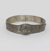A collection of silver jewellery, including a silver bangle by Alexander Richie of Iona Celtic