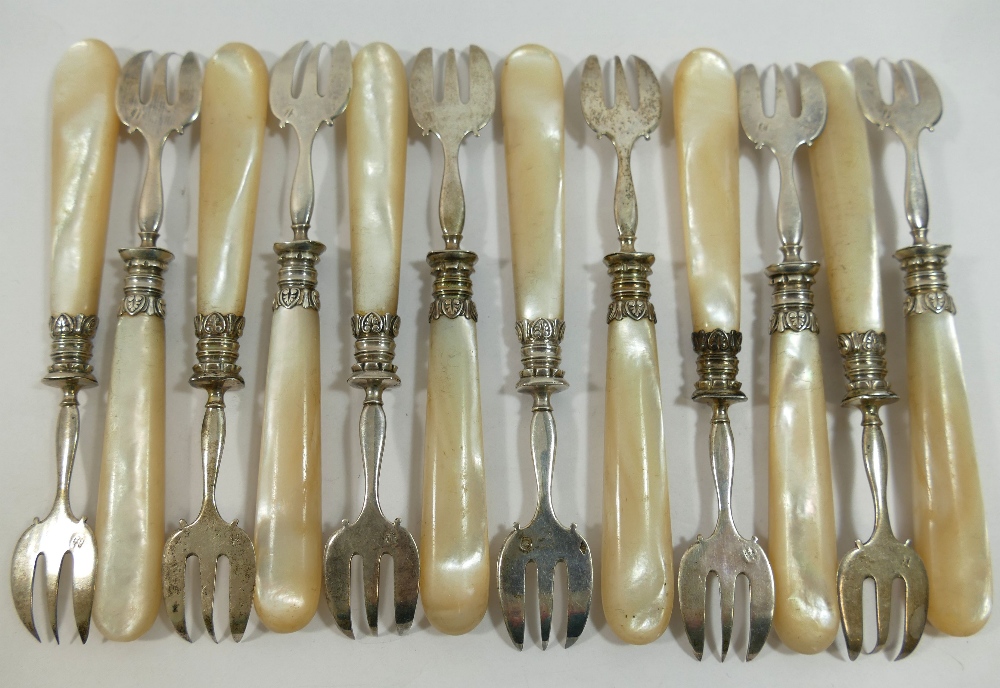 A set of twelve 19th century French silver oyster forks with mother of pearl handles, each bearing a - Image 2 of 2