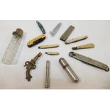 A collection of miscellaneous items comprised of assorted folding penknives, a novelty whistle in